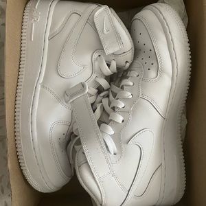 High-top Nike Air Force Ones (AF1s)